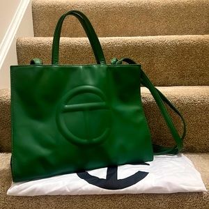 Telfar Leaf Green medium size cross body bag.